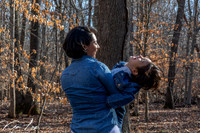 Family-Photography-Mother-Holding-Son-Laughing