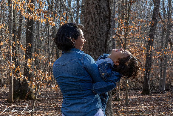 Family-Photography-Mother-Holding-Son-Laughing